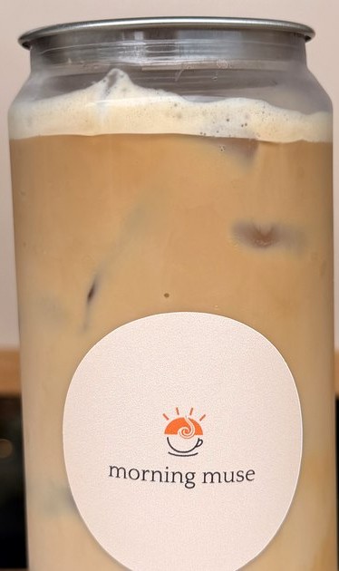 A Morning Muse iced coffee in a branded can